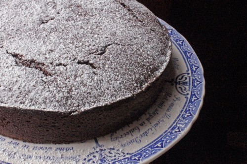 A cake on a vintage serving plate.