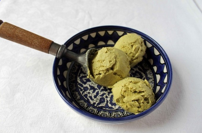 Avocado Pistachio Ice Cream in a bowl on a white table
