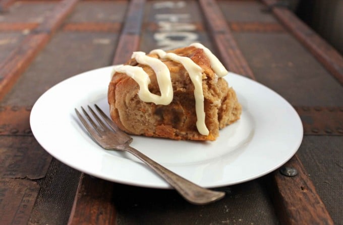 A cinnamon bun on a plate.