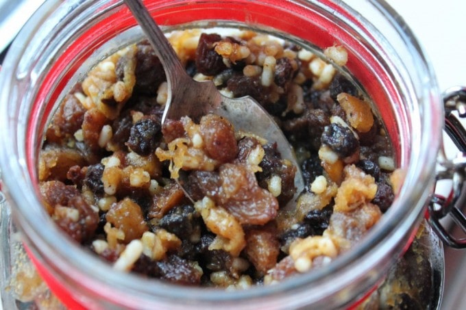 Close up of Pumpkin Mincemeat in a jar with a spoon.