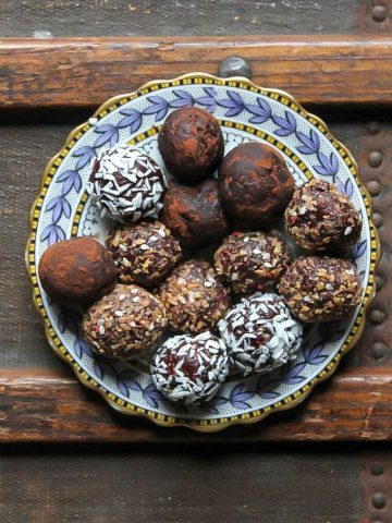 Bliss balls on a plate.