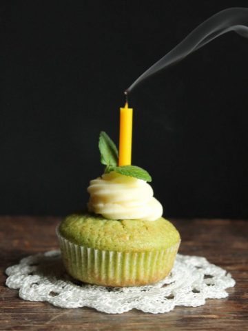 A cupcake with a blown out candle.