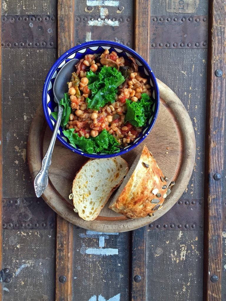 Bowl of stew with bread. 