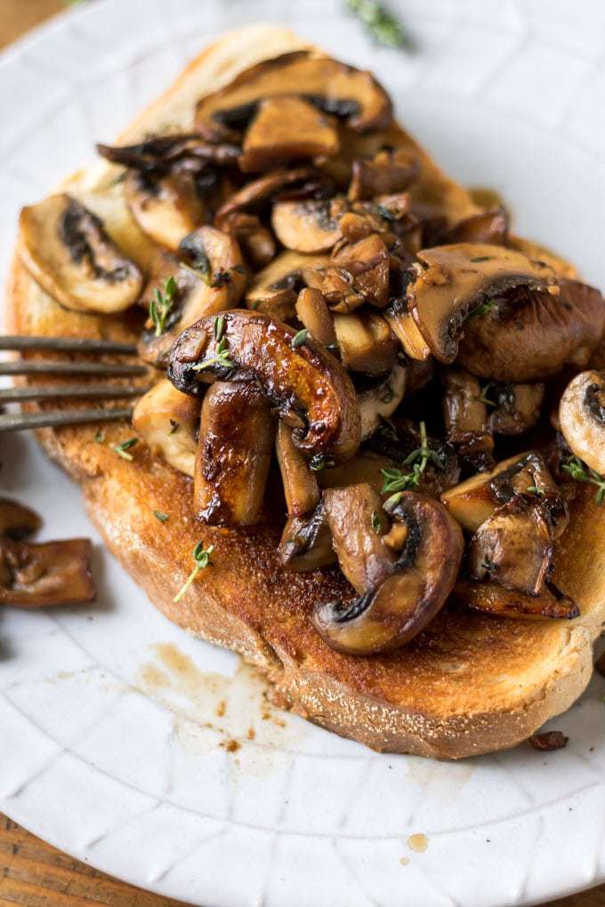 Close up of mushrooms on toast.