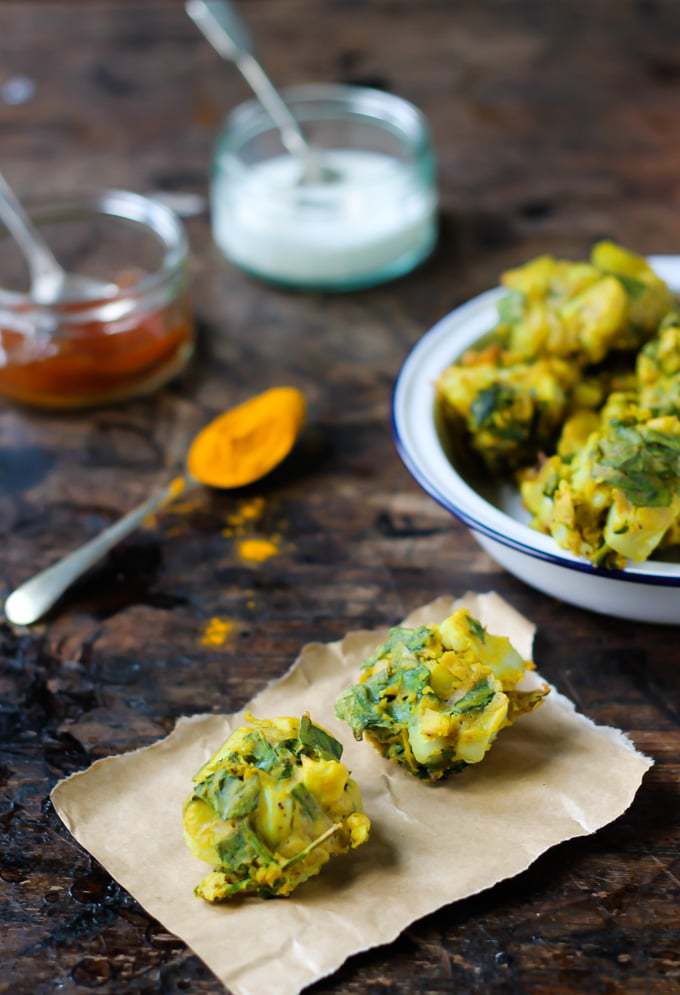 Pakoras on a piece of baking paper.