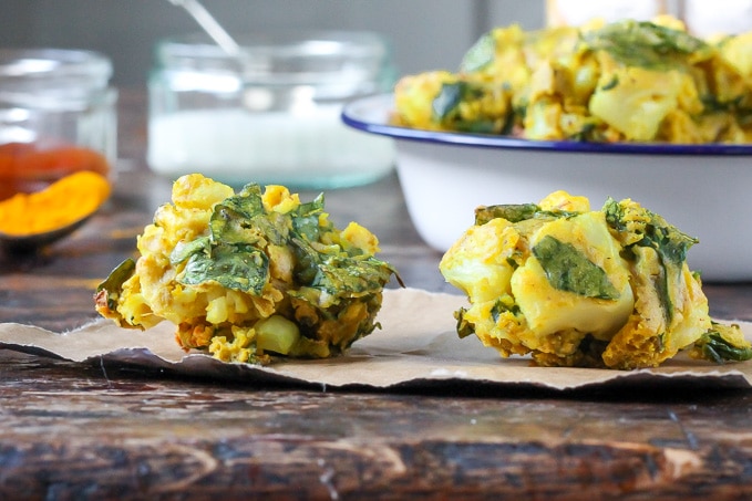 Close up of two pakoras.