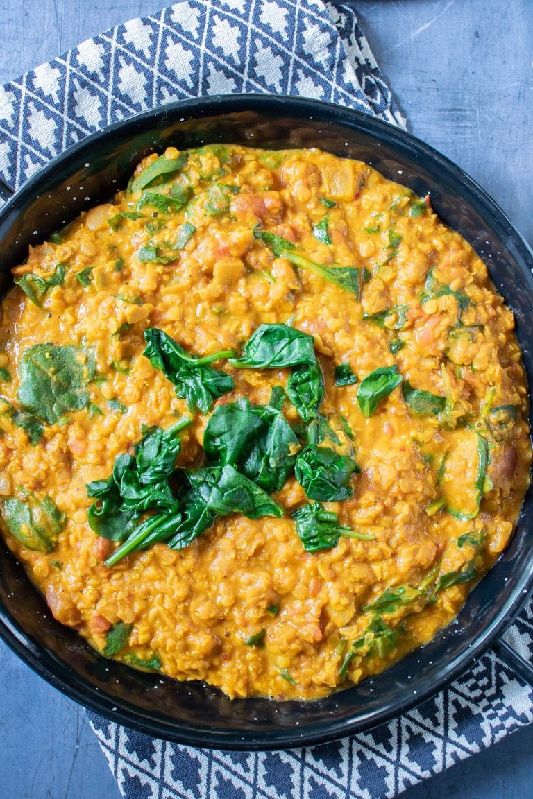 Close up of serving dish of lentil dhal.