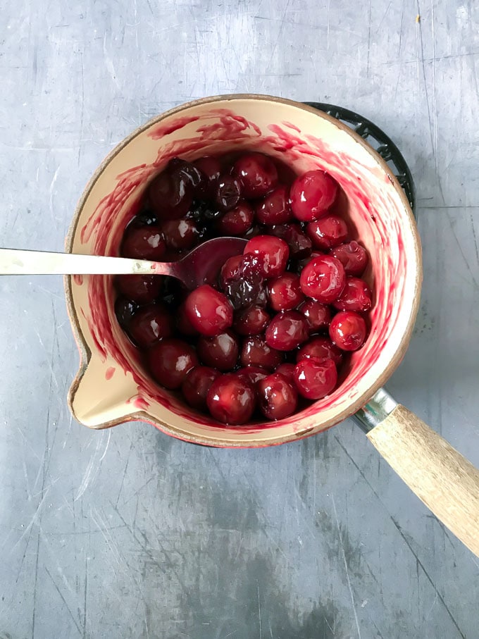 cherries in a pot.