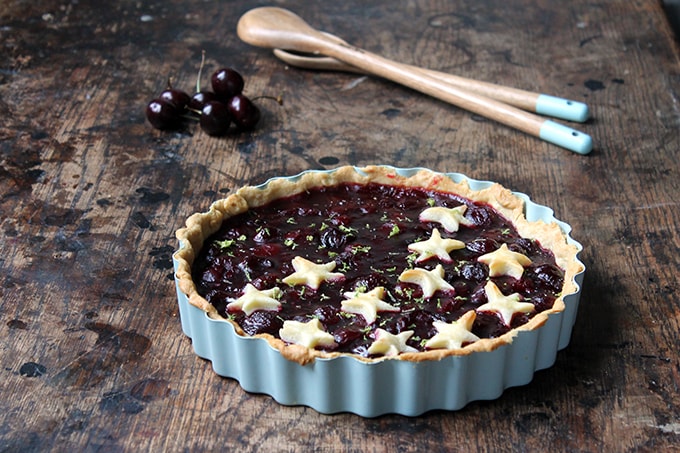 Pie in a pan on a wooden table.