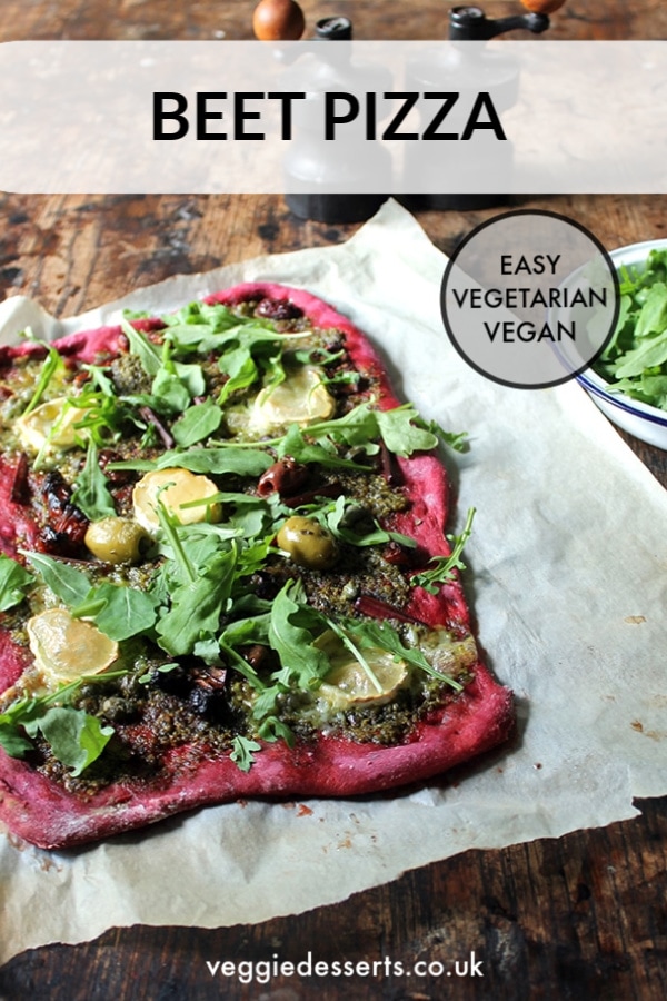 Beet pizza is eye-catching and delicious. The vegan pizza crust recipe is bright purple from the addition of beets (you can't taste them). Plus, it uses the entire beetroot - from root to leaf - in the pizza, beet leaf pesto and toppings. #veganpizza #beetpizza #beetleaves