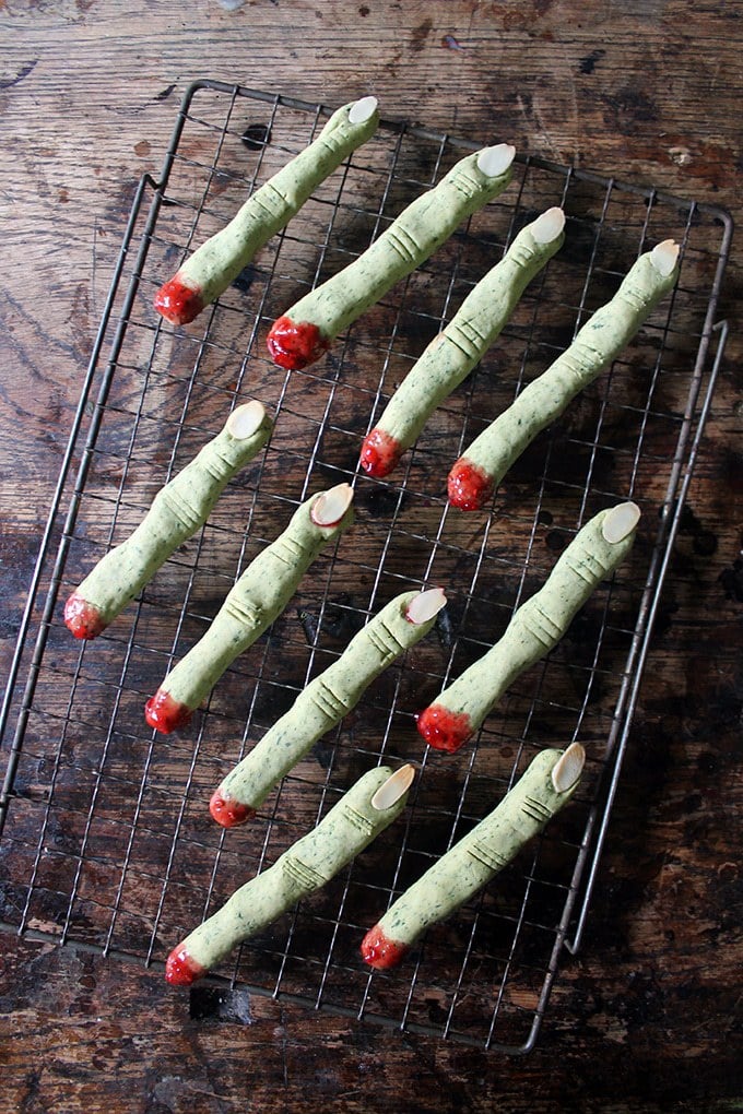 Rows of cookies shaped like fingers for halloween.