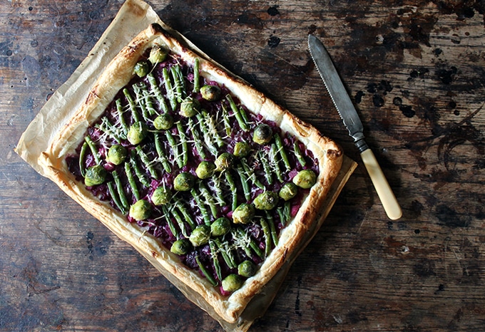 Red Cabbage and Sprout Tart on a table.