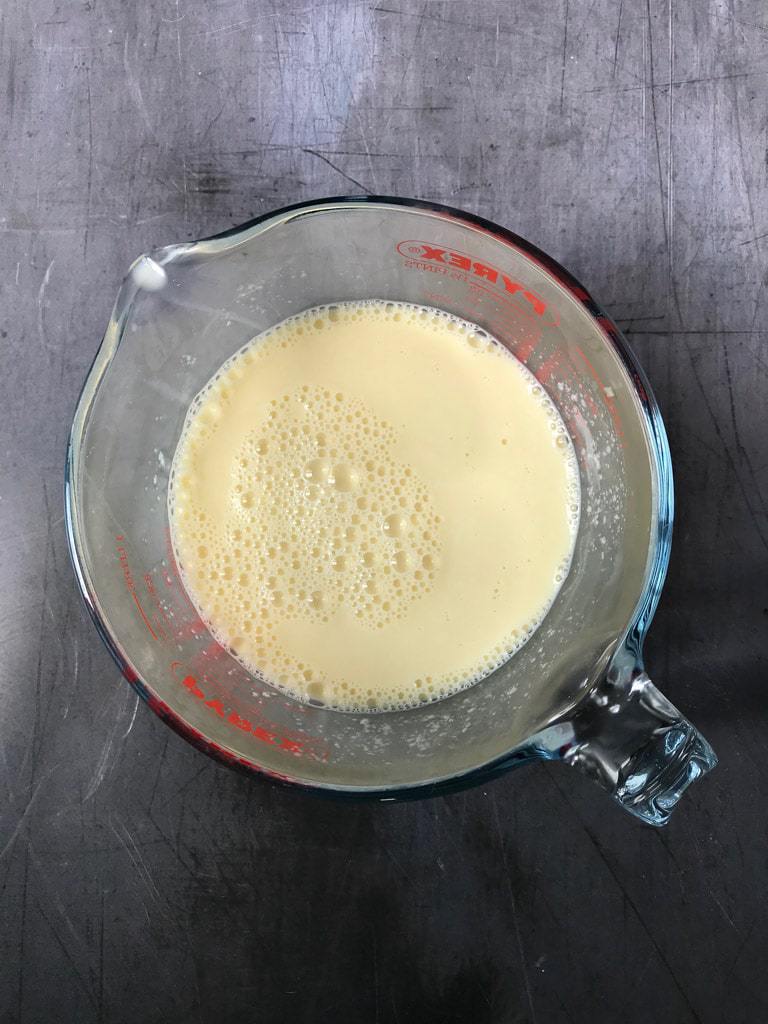 How to make vegan chocolate cake - step 1 add lemon juice to plant milk