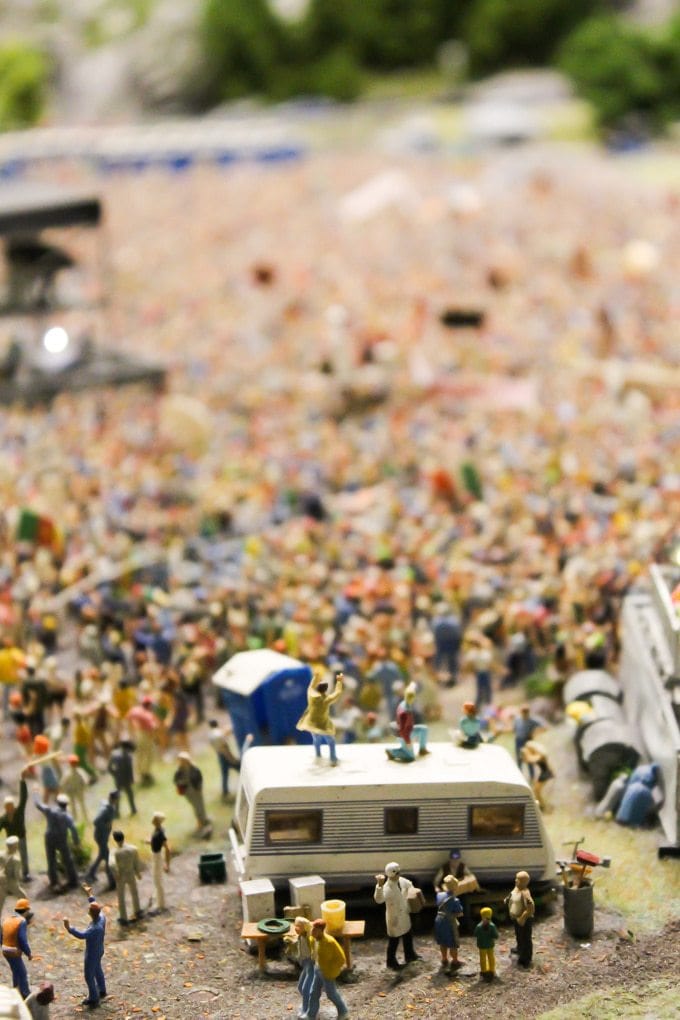 A model of a group of people at a festival.