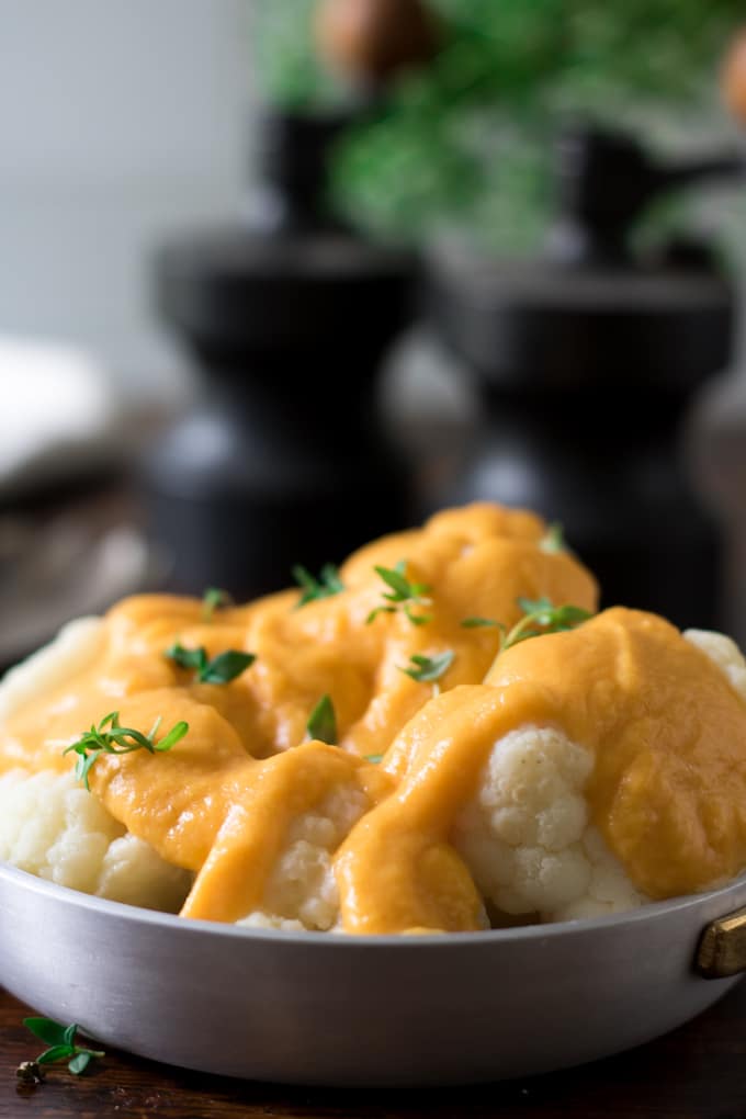 Close up of sauce on cauliflower.