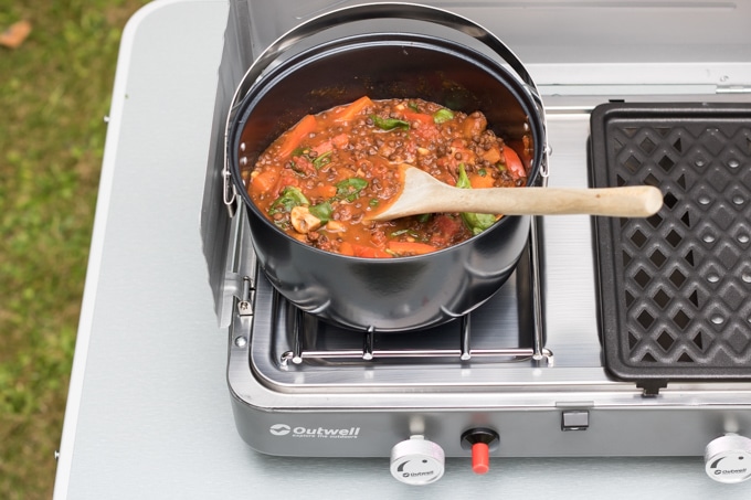 Pan of stew on a camping stove.
