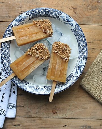 Popsicles on a bowl of ice.  Apple Parsnip Cupcakes with Boozy Apple Ci Apple CrumbleLolliessm 360x453
