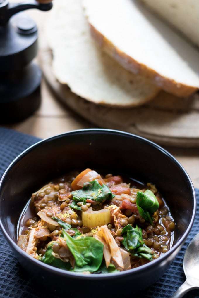 Easy and tasty crock pot lentil vegetable casserole with harissa paste. It's a hearty vegan stew that's full of flavour and easy to prepare.