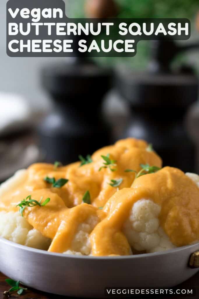 Dish of cauliflower cheese, with text: Vegan Butternut Squash Cheese Sauce.
