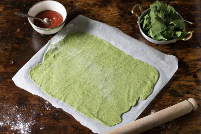 Bright green homemade pizza crust - with spinach! Get the recipe for spinach pizza crust on VeggieDesserts.com