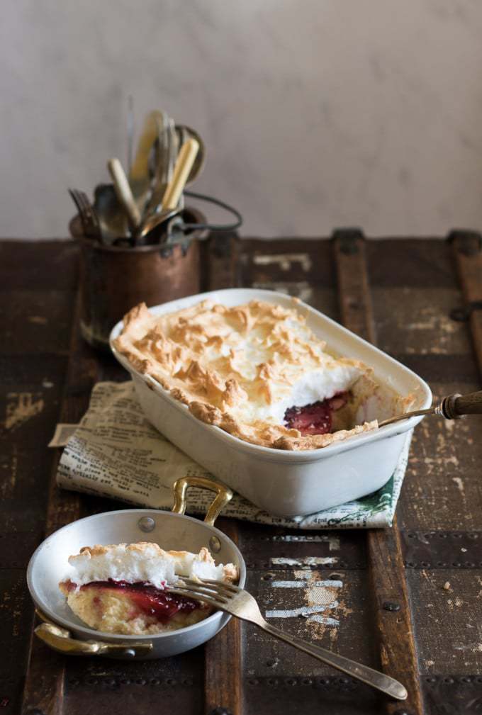 Serving dish and plateful of pudding.