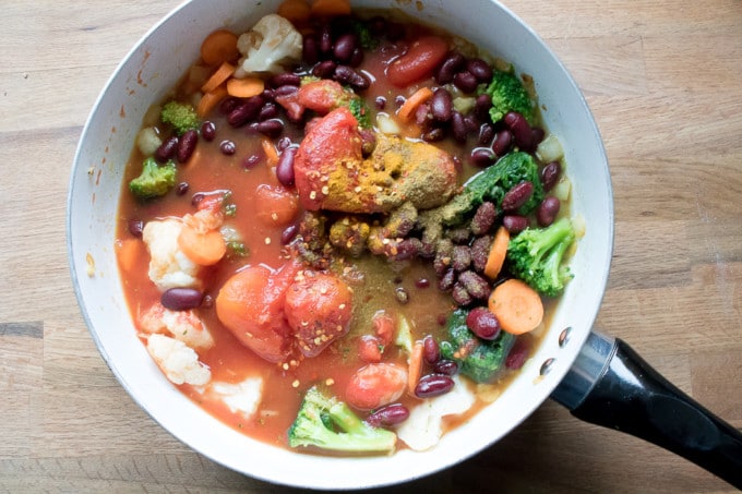 Easy Vegan Peanut Stew: Ingredients in the pan ready to simmer. 