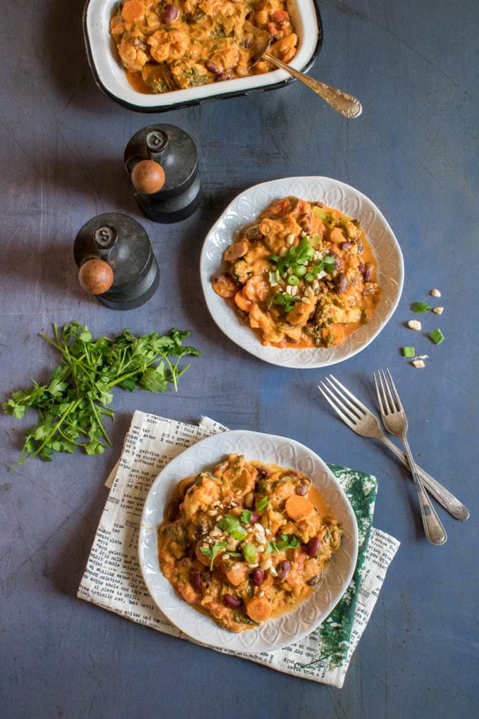 Table with plates of stew.