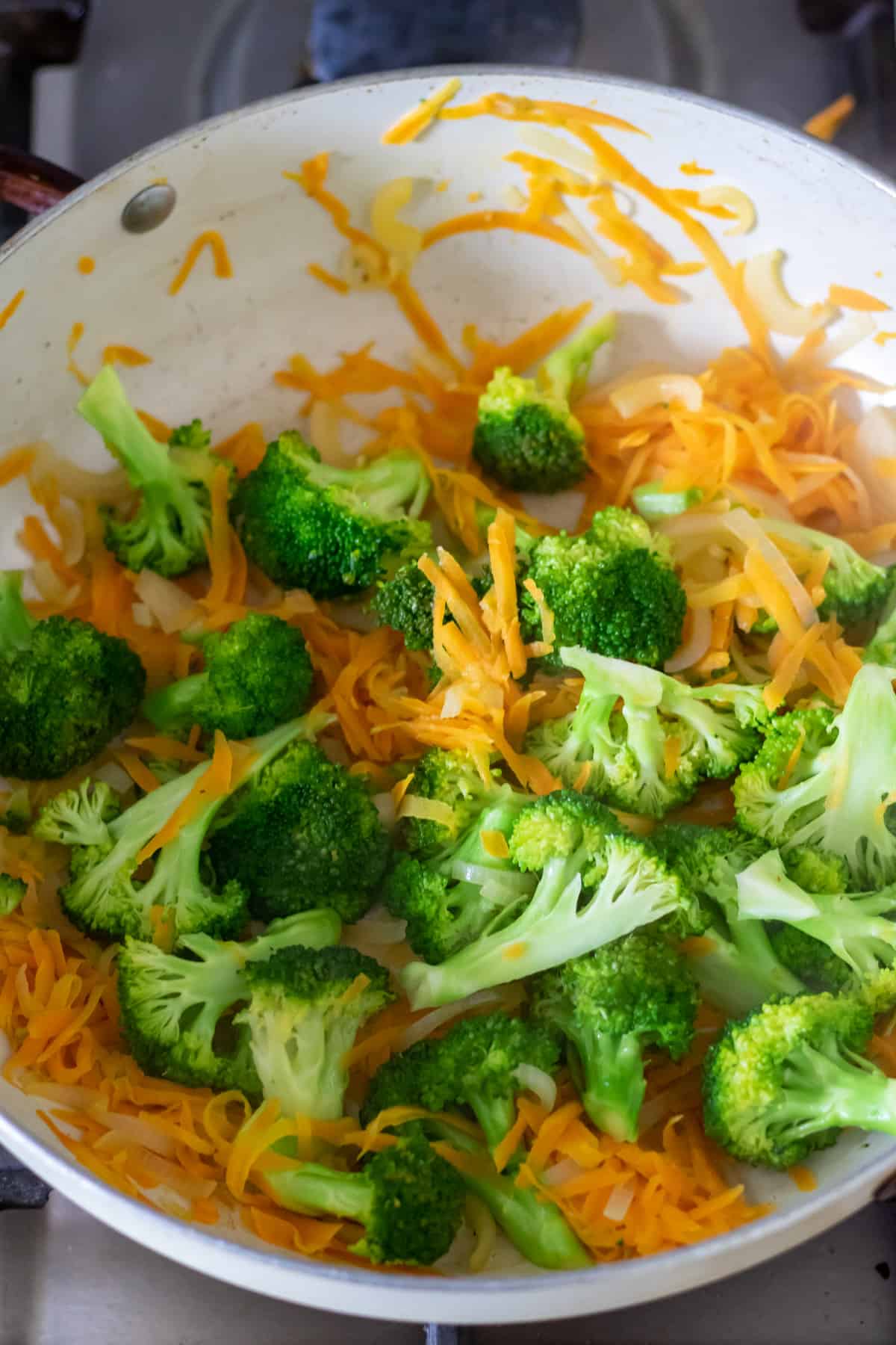 Cooking carrot and broccoli.