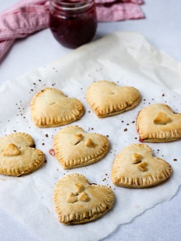 Easy Jam Hand Pies with a pot of strawberry jam