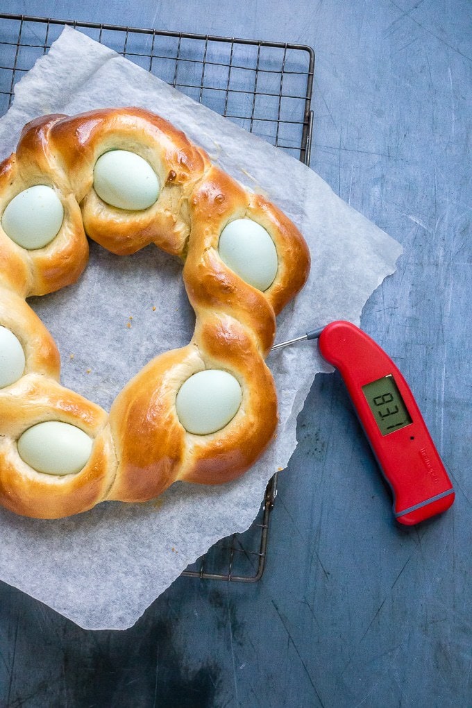 Testing the Italian Easter Braided Bread Wreath is done with a food thermometer.
