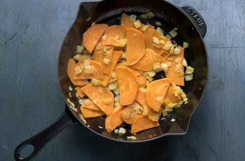 How to make sweet potato frittata: step 2 - cook the onion and sweet potato until soft and golden