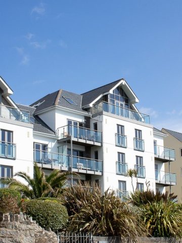 The exterior of Gylly Sunrise - self catering penthouse apartment in Falmouth, Cornwall. Bookable through Classic Cottages.