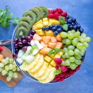 Fruit tray on a platter stand.