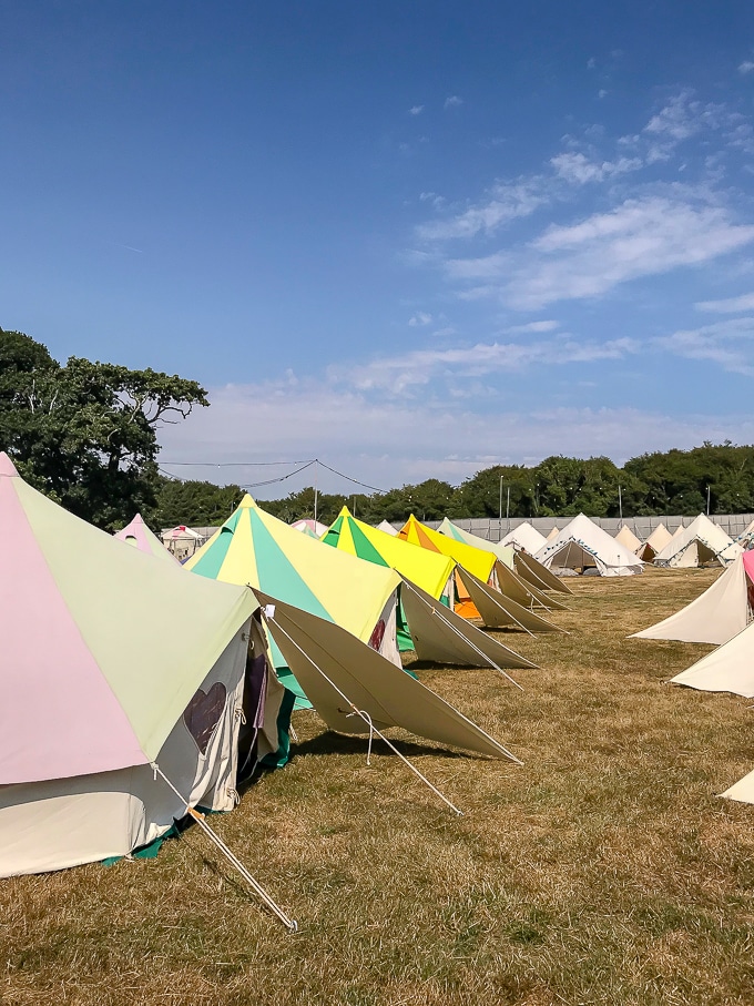 Row of brightly coloured bell tents - Bellepads by Podpads review