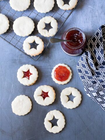 Making jammy dodgers recipe (also known in USA as Linzer cookies) shortbread with jam