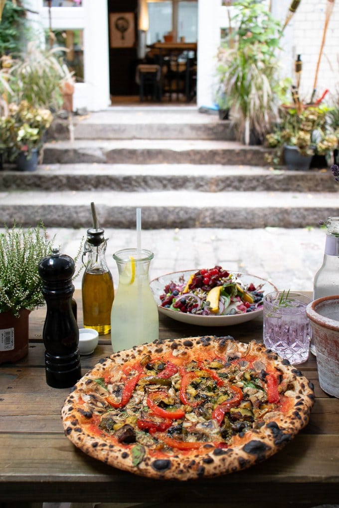 Vegan pizza and salad at Jill's Pizzeria, Hamburg Germany