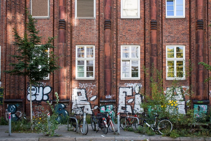 Sternschanze Hamburg - brick building with graffiti and bicycles