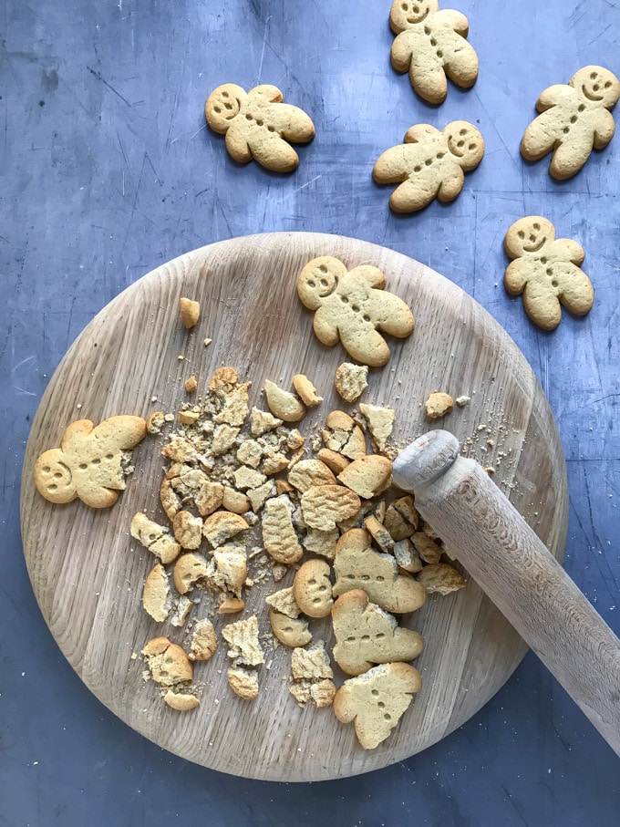 How to make Pear and Gingerbread Parfait - Step 2: Bash the gingerbread men with a rolling pin.