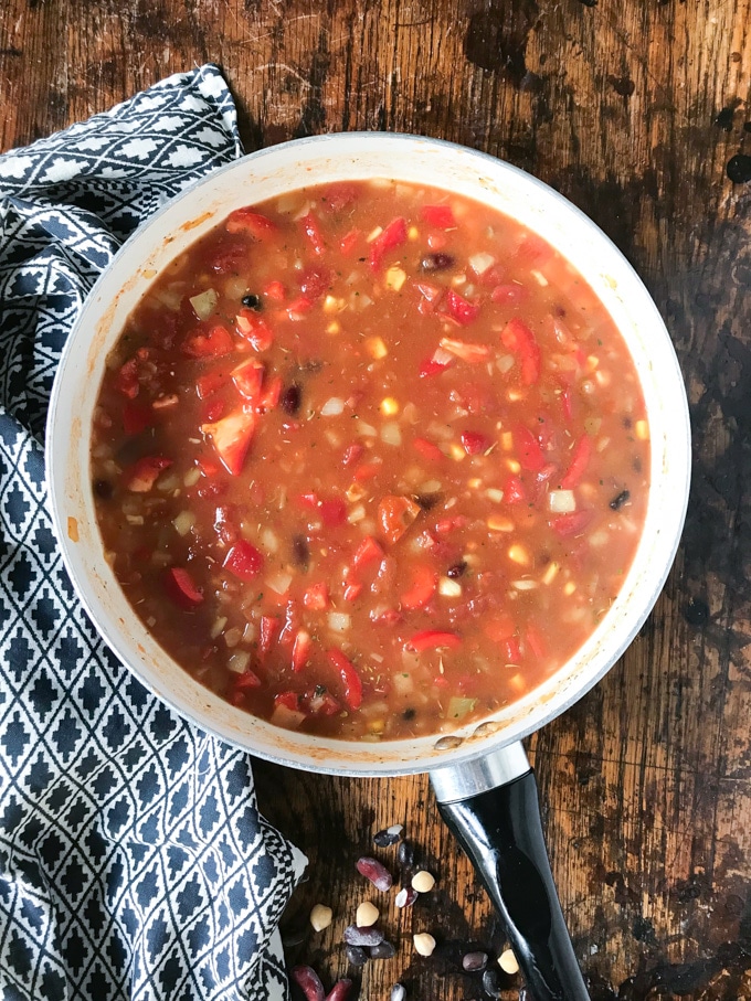 How to make Mexican Bean Soup. Step 3: Give it all a good stir, bring to the boil, reduce the heat and simmer for 10-12 minutes. 