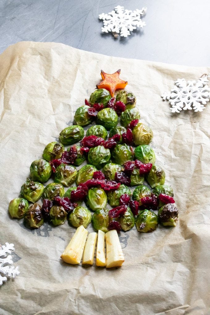 Tray of roasted brussels sprouts in the shape of a tree.