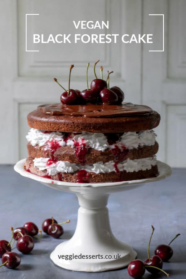 This vegan Black Forest Cake has all the moist, delicious flavour of the 1970s classic gateau - but it's easy to make. The rich, fluffy vegan chocolate sponge is filled with dairy free cream and decadent cherries in syrup. It's a showstopper of a cake. #vegancake #blackforestcake #chocolatevegancake #veganchocolatecake