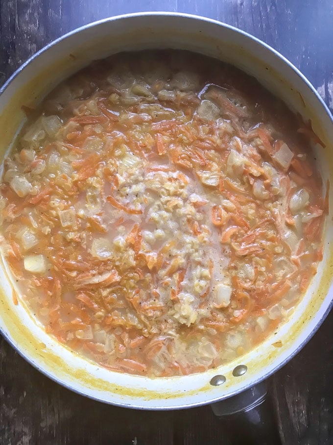 Soup simmering in a pot.