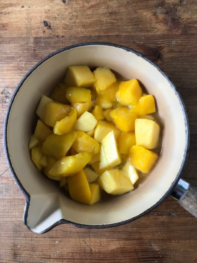 Pot of cooked mango.