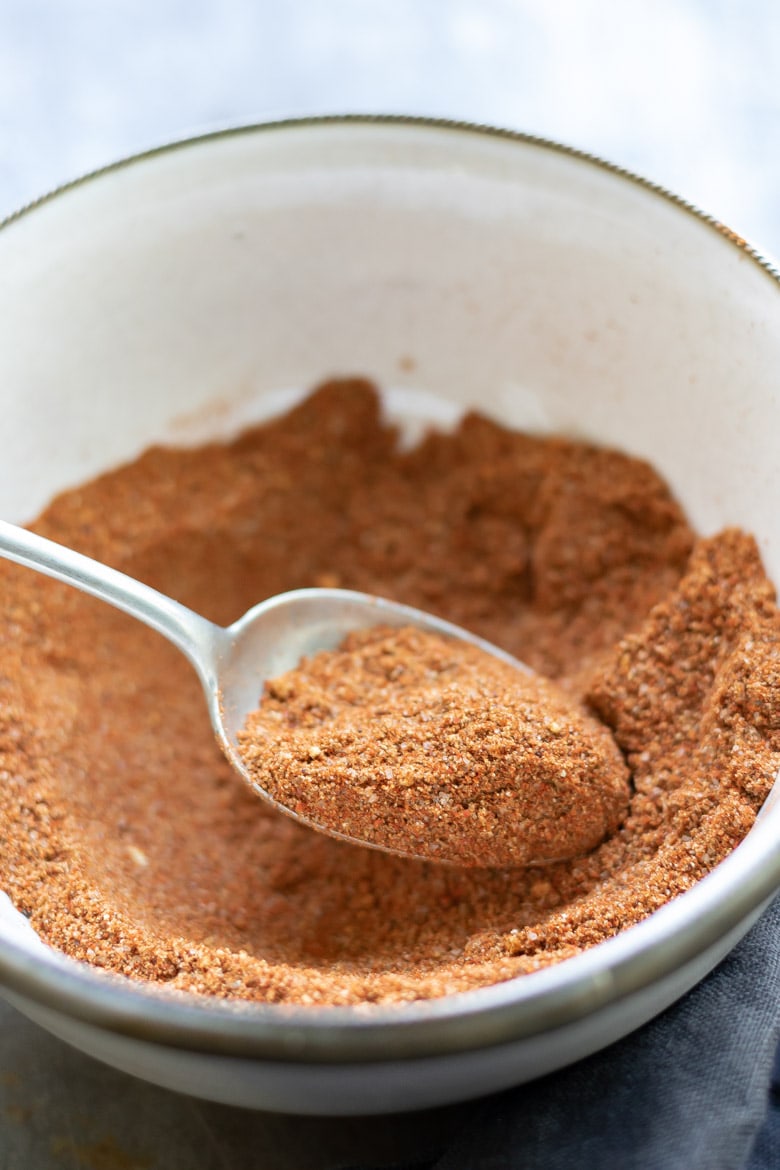 Close up of a spoon of homemade Old Bay Seasoning spice mix.