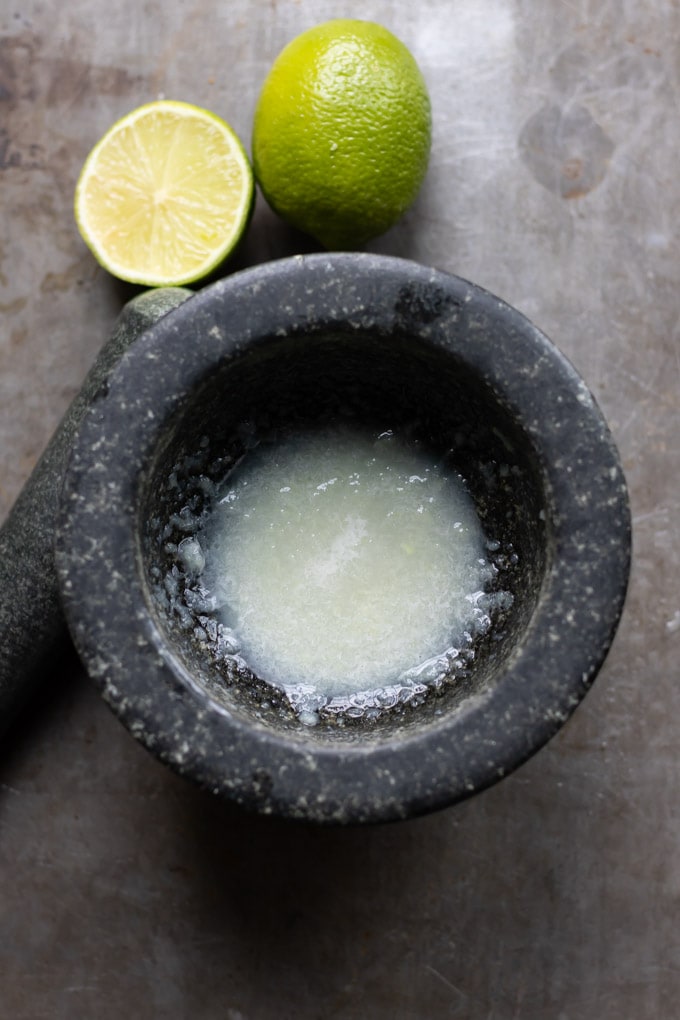 Lime juice added to the pestle and mortar.
