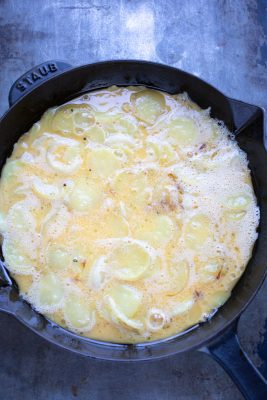 Skillet of eggs, potatoes and onions.