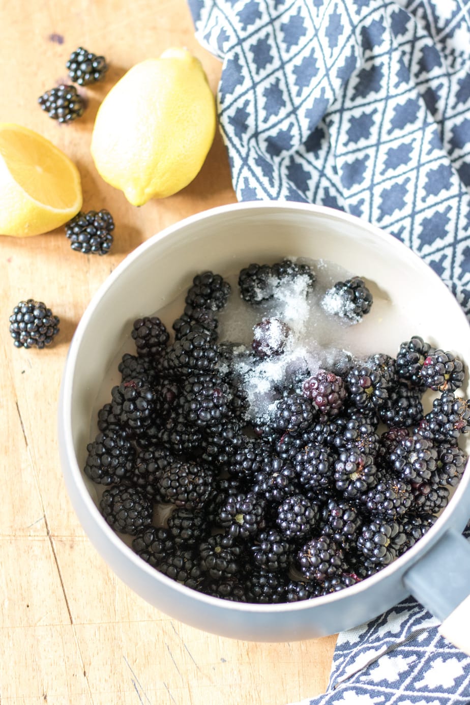 Pot of blackberries and sugar.