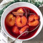 Bowl of cooked plums.