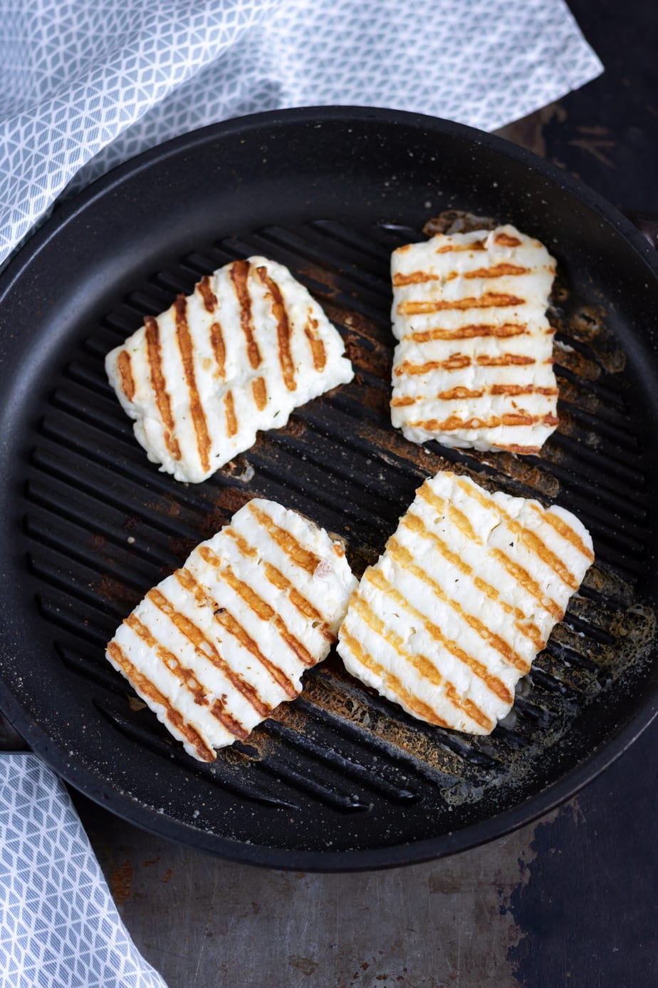 Halloumi grilled in a pan.