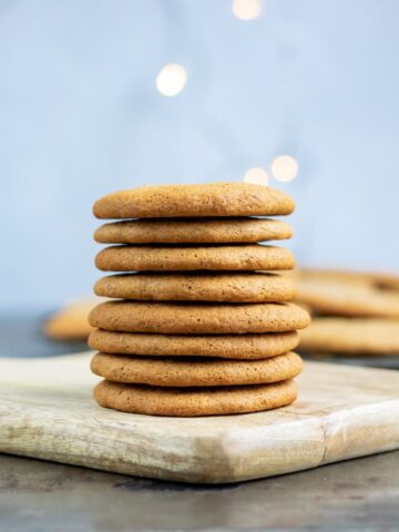 Stack of cookies with lights in the background.